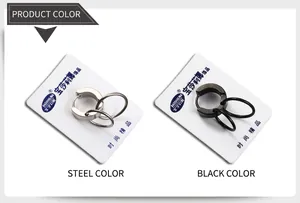 Detail view of steel and black punk hoop earrings with textured finish and spring clasp