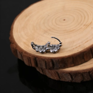 Men's silver stainless steel hinged hoop earrings featuring a detailed wing pattern design