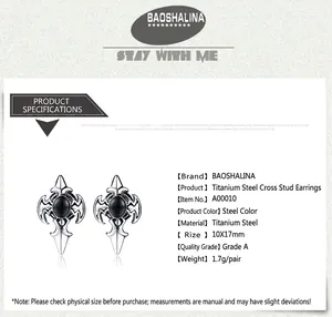 Macro view of steel cross stud earring with black stone inlay and vintage engraving