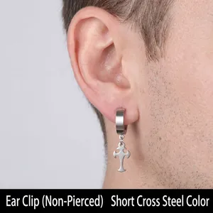 Close-up of non-piercing stainless steel ear clip with short cross pendant on model