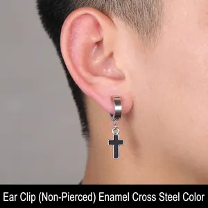 Detail of stainless steel clip-on earring with black and silver cross charm for men