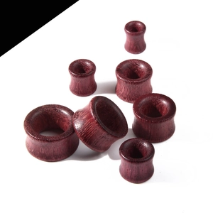 Purple wood ear gauge set with natural grain and polished finish for ear stretching