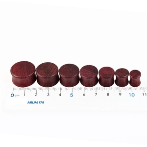 Set of 7 double flare heart-shaped violet wood ear plugs with natural grain finish