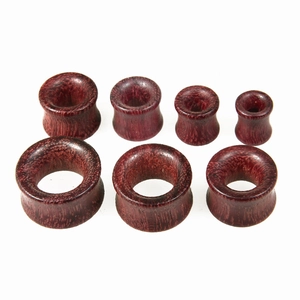 Deep red wood double flare ear gauges in 7 different sizes for ear piercing