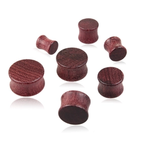 Polished heartwood saddle ear plugs in various sizes with natural dark wood grain finish