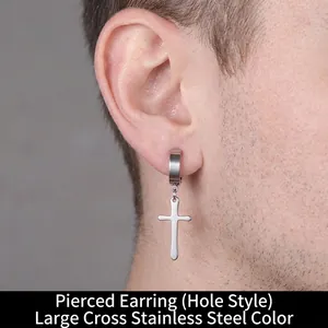 Detailed view of a stainless steel cross dangle earring on model for pierced ears