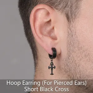 Detail shot of a black stainless steel cross drop earring for pierced ears in punk style