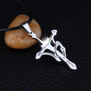 Silver Taurus zodiac cross pendant in 316L stainless steel with black cord necklace