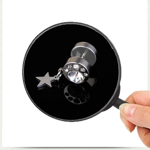Titanium steel barbell earring with cubic zirconia paw print and small star pendant
