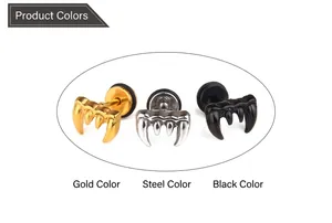 Detail of retro wolf fang ear studs in gold, steel, and black surgical stainless steel