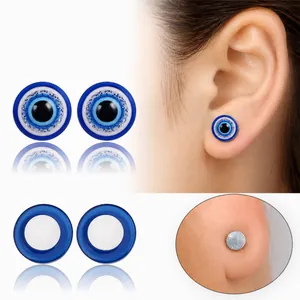 Magnetic evil eye stud earrings with blue glitter and non-pierced suction design