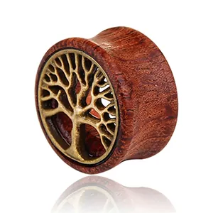 Vintage wood and alloy ear plug featuring a bronze Tree of Life relief and a polished finish