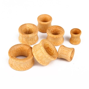 Natural double flared bamboo ear plugs set featuring organic grain and multiple sizes