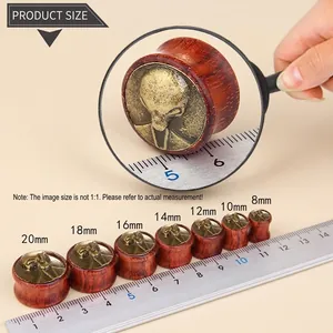 Size chart for alien wood ear plugs showing diameters from 8mm to 20mm with ruler detail