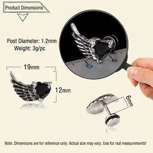 Technical drawing showing 19mm x 12mm vintage angel wing stud earrings with black heart stone