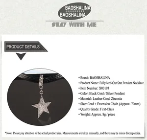 Close-up of sparkling star pendant choker with black cord and 70mm extension chain