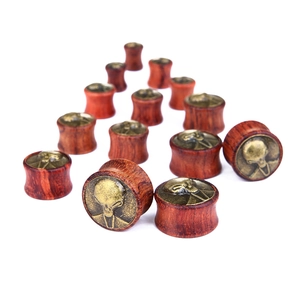 Vintage wood ear plugs with bronze alien head inlay in double flared saddle design