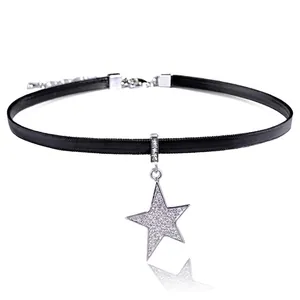 Classic black choker necklace with a shimmering silver star pendant and lobster clasp