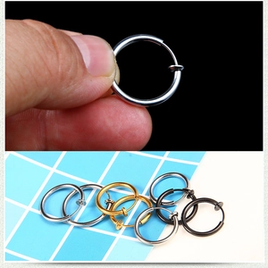 Detail of stainless steel spring clip-on earrings in silver, gold, and black colors