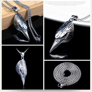 Punk style stainless steel necklace featuring a vintage silver eagle skull pendant design
