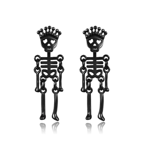 Gothic black skull skeleton earrings with heart eyes and crown on white background