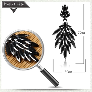 Detailed view of luxury black crystal drop earrings showing 70mm by 30mm dimensions