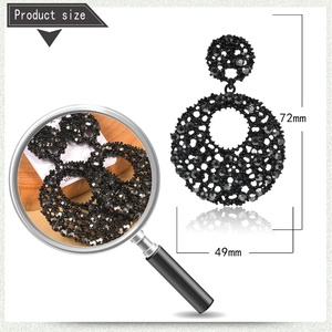 Detail showing dimensions and close-up of crystal encrusted black dangling hoop earrings
