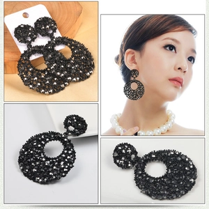 Luxury oversized black crystal round drop earrings for women in a four-view collage