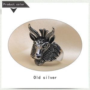 Detailed view of goat head ring with pentagram star on forehead in antique silver finish