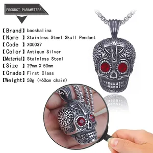 Macro detail of gothic skull pendant with red gemstones and stainless steel chain dimensions