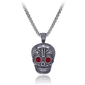 Hip hop stainless steel skull necklace with red gemstone eyes and cross engraving