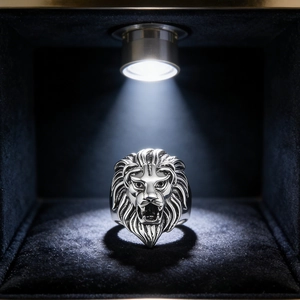 Men's vintage lion totem ring in polished stainless steel displayed in a luxury gift box