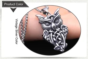 Macro shot of antique silver owl pendant with intricate Celtic knot patterns on a metal chain