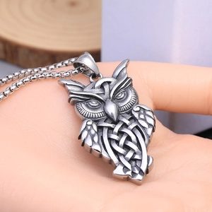 Vintage stainless steel eagle pendant necklace with celtic knot detailing on box chain