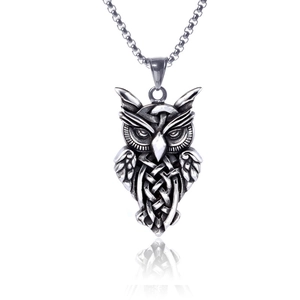 Vintage stainless steel owl pendant necklace with intricate Celtic knot patterns