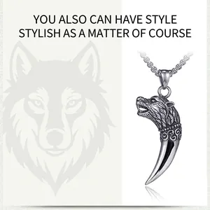 Detail of retro steel wolf fang pendant necklace with polished finish and box chain for men
