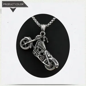 Detailed view of stainless steel motorcycle pendant with vintage finish and ball chain