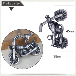Detail view of vintage stainless steel motorcycle pendant with 45mm by 38mm dimensions