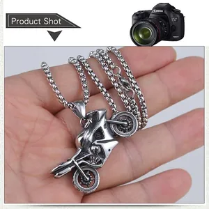 Detailed close-up of a vintage motorcycle pendant made from durable stainless steel