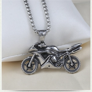 Macro shot of 316L stainless steel hallmark on a vintage motorcycle pendant necklace