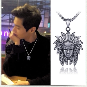 Detailed view of retro Indian chief pendant on a round link chain for men