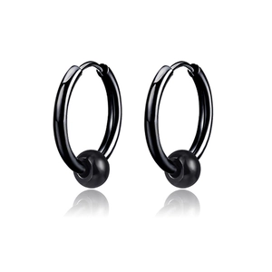 Pair of black titanium steel hoop earrings with movable beads on a white reflective base