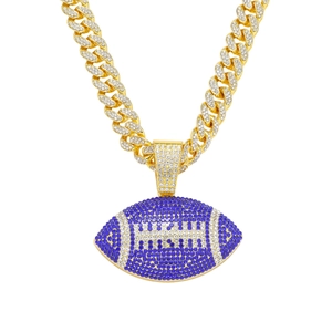 Iced out gold Cuban chain with blue and white crystal encrusted football pendant
