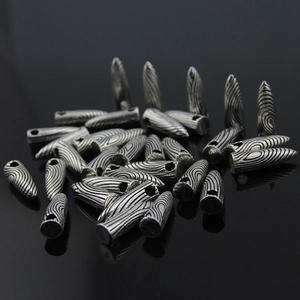 Striped silver bullet pendants with S925 stamp shown on a reflective black background