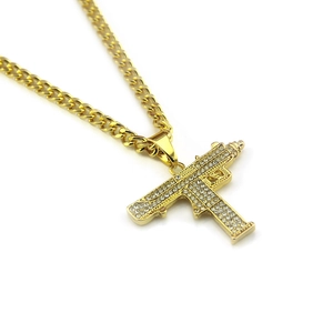 Hip hop gold Uzi pendant necklace with sparkling crystals and Cuban chain link