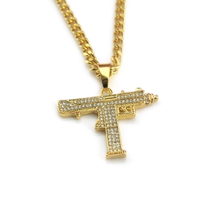 Hip hop gold Uzi gun pendant necklace for men with sparkling crystals on curb chain