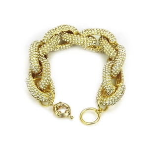 Bracelet à grosse maille dorée serti de cristaux brillants avec fermoir à ressort