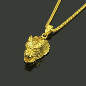 Golden wolf head pendant necklace with twisted rope chain in a high-shine finish