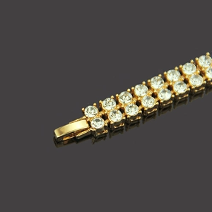 Bracciale hip-hop da uomo placcato oro con due file di strass scintillanti incastonati