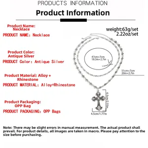 Size chart showing double-layered antique silver cross necklace with rhinestone details